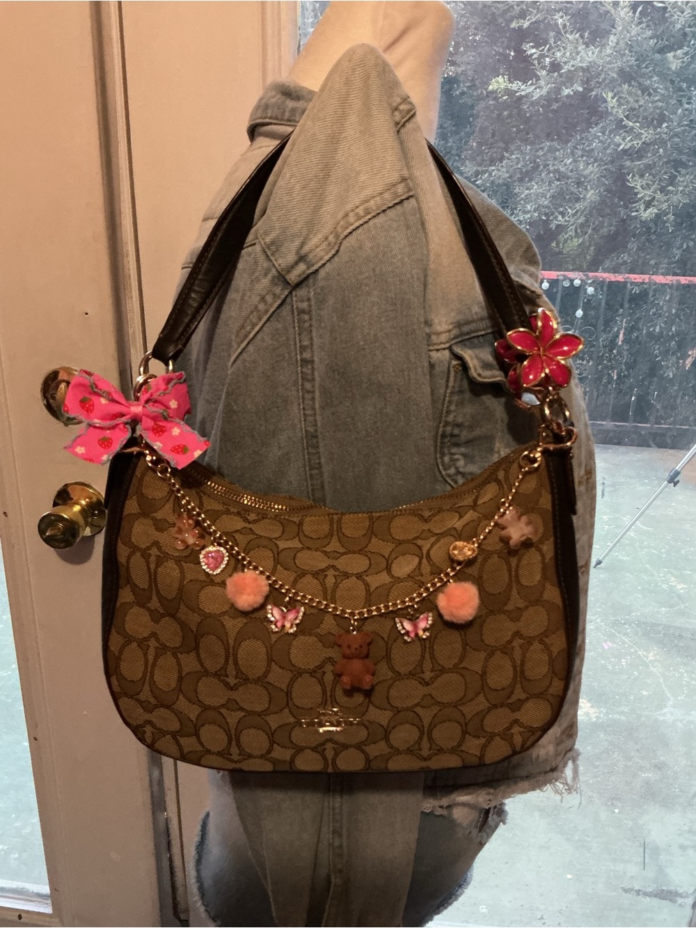 Coach Brown Signature Canvas Shoulder Bag with Pink Charm Accents